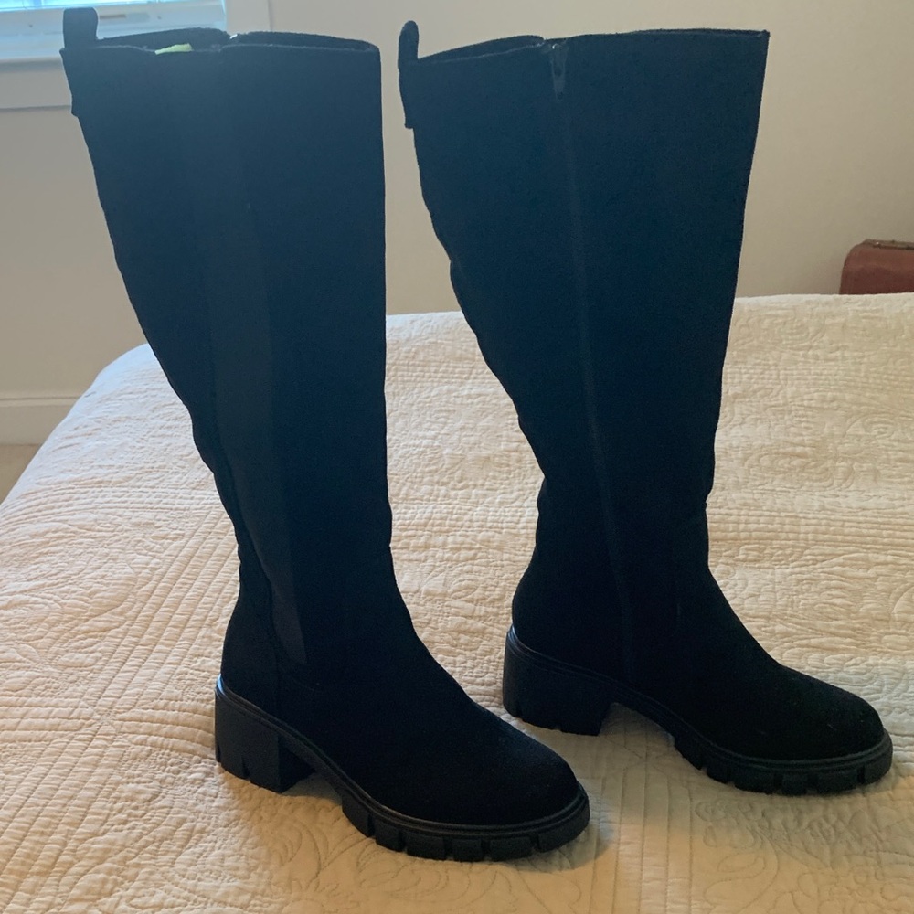 Never worn Woman’s SO faux suede black size 8 wide calf boots with lug sole.
